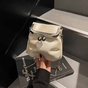 Chic pleated crossbody bag with metal kiss-lock and silver chain in cream finish