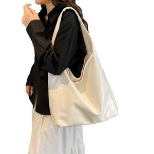 Fashionable off-white large capacity bucket bag with soft leather and wide shoulder strap