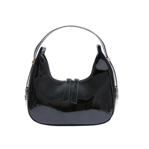 Minimalist black patent leather crescent hobo bag with high gloss finish and double zippers