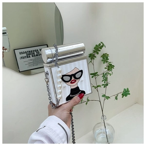 Cartoon print white crossbody bag with pearl chain strap and metal clasp on the top