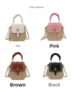 Mini borse in paglia nei colori beige, rosa, marrone e nero con manici in pelle e fibbia
