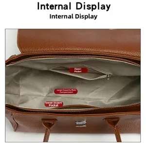 Interior view of brown leather tote showing zipper pocket and spacious main compartment