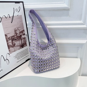Retro lavender purple leather hobo bag with silver metal studs in a stylish crescent design