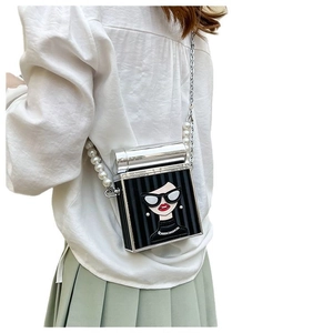 Chic cartoon girl print crossbody bag with pearl chain strap and striped pattern