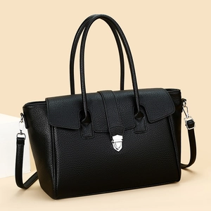 Black pebbled leather tote bag with silver lock and detachable shoulder strap