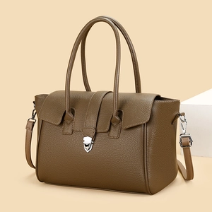 Deep brown lychee pattern leather tote bag with silver metal lock and top handle