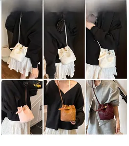 Mini color-block bucket bags shown in white, pink, brown and wine red from multiple angles