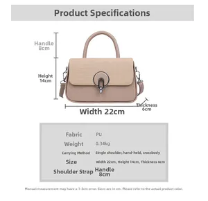 Detail view of woven texture small square bag with circular metal buckle and size specifications