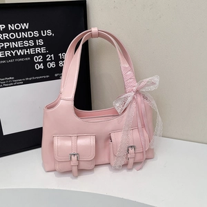 Pink PU leather shoulder bag with buckle pockets and a white lace bow decoration
