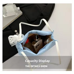 Detail view of large capacity blue canvas tote bag showing interior storage space