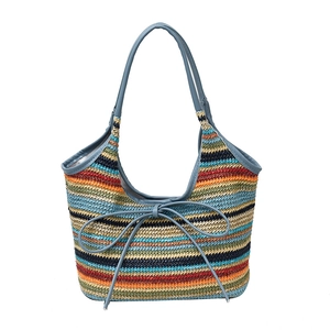 Sac cabas en paille à rayures avec anses en cuir bleu et nœud pour les vacances à la plage
