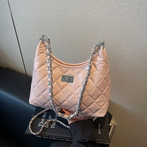 Pink quilted half-moon chain bag with glossy finish and silver rectangular clasp