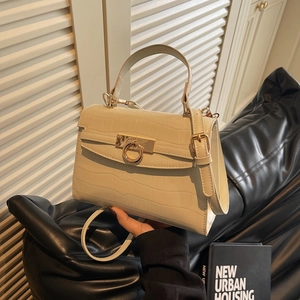 Beige faux crocodile leather handbag with golden ring buckle and adjustable shoulder strap