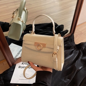 Creamy white crocodile embossed Kelly bag with gold ring buckle and adjustable strap