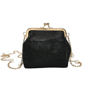 Elegant black rhinestone evening bag with gold hardware and pearl-studded chain strap