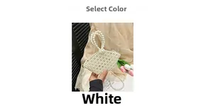 Detailed view of handmade pearl woven handbag featuring polished beads and chain strap