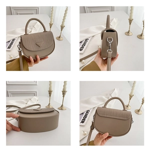 Detailansicht der khakifarbenen Box-Tasche mit gewebter Textur und Leder-Dreieckspatch