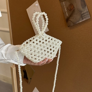 Handmade pearl woven crossbody bag for women in white with top handles and strap