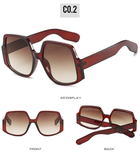 Three-way view of irregular oversized sunglasses with dark tea frames and gradient lenses