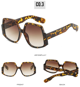 Three-view display of oversized tortoise frame sunglasses with dark brown gradient lenses