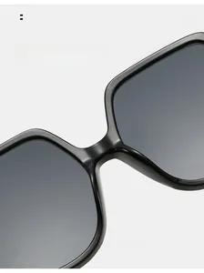 Detail shot of the integrated comfortable nose pads on black oversized sunglasses