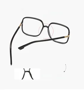 Detail view of the self-adjusting nasal support on square black fashion glasses