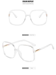 Detailed views of transparent square frame glasses with blue light blocking lenses