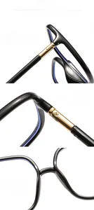 Detail view of reinforced metal hinges and integrated nose pads on black frame glasses