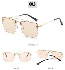 Three views of rimless double bridge sunglasses with scalloped lens edges and gold frame