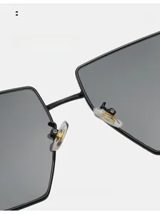 Detail of soft silicone nose pads on square metal sunglasses for comfortable wearing
