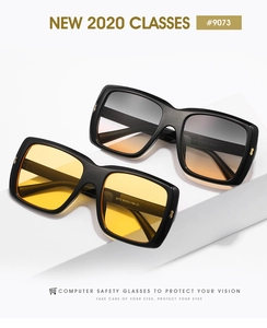 Détail de lunettes de soleil carrées avec charnières dorées et monture noire polie brillante