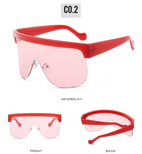 Three-view display of red oversized shield sunglasses with pink lenses and metal nose pads