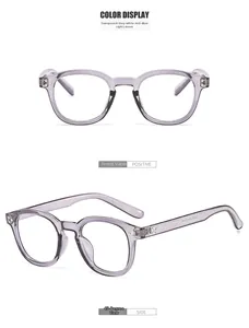 Lunettes anti-lumière bleue gris transparent avec détails métalliques et vue latérale