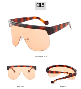Three-angle view of tortoiseshell oversized shield sunglasses with orange transparent lenses