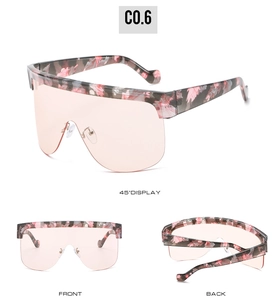 Three-angle view of oversized pink floral sunglasses with wrap-around transparent lenses