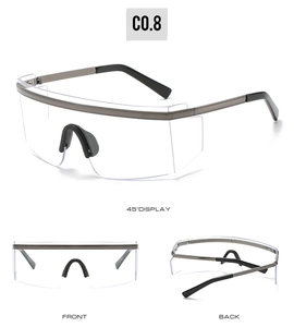 Détail de lunettes de soleil surdimensionnées avec monture en métal et plaquettes de nez