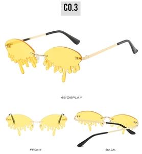 Three-angle display of yellow teardrop shaped sunglasses with gold metal frame