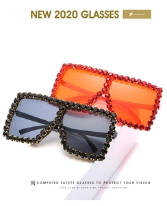 Close-up of oversized square sunglasses featuring premium full rhinestone crystal trim