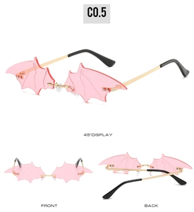 Three-view display of bat-shaped rimless sunglasses with pink lenses and gold frame