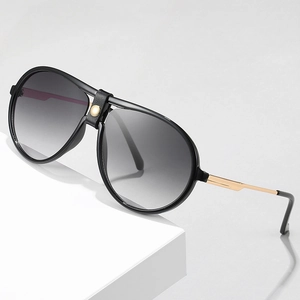 Chic aviator sunglasses with gradient gray lenses and black leather bridge detail