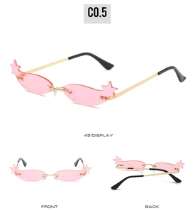 Multiple views of star shaped rimless sunglasses with pink lenses and gold metal frames