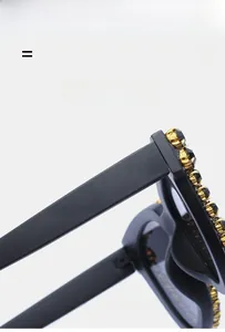 Macro detail of high-quality black rhinestones on a matte black luxury sunglasses frame