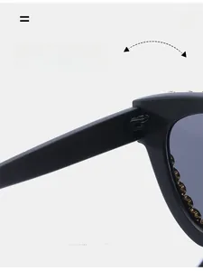 Detail view of durable metal hinges and black matte frame with gold bead studs