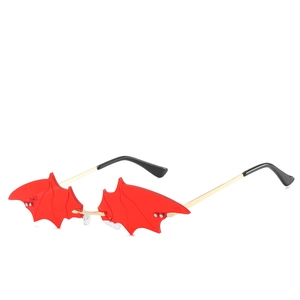 Gothic bat-wing rimless sunglasses with red lenses and gold metal frame for Halloween