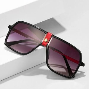 Chic oversized square sunglasses with black frame and red leather bridge detail