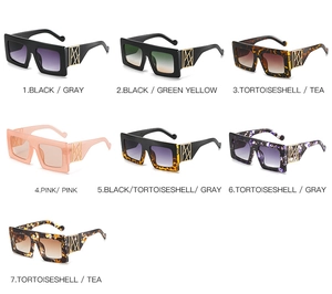 Detailed grid of oversized square sunglasses featuring elegant gold geometric metal hinges