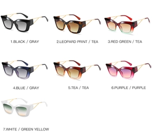 Detailed view of seven colorful cat-eye sunglasses with gold metal hollowed-out temples