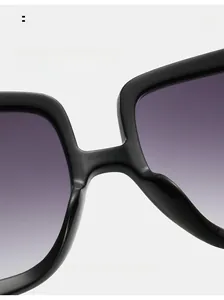 Detail of square oversized sunglasses showing integrated comfortable nose pads design