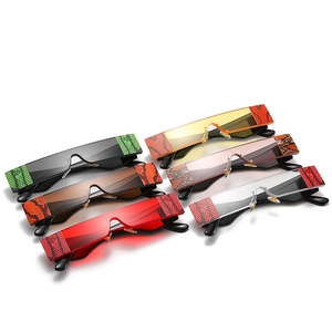 Set of frameless rectangular sunglasses with tinted lenses and snakeskin textured edges