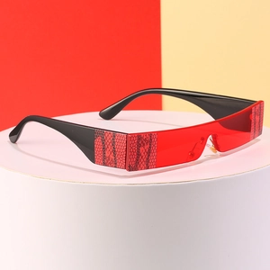 Rectangle sunglasses with red lenses and snake skin print accents on black temples